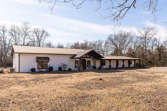 single story home featuring cooling unit