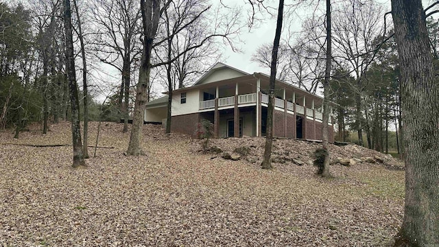 rear view of house with a deck