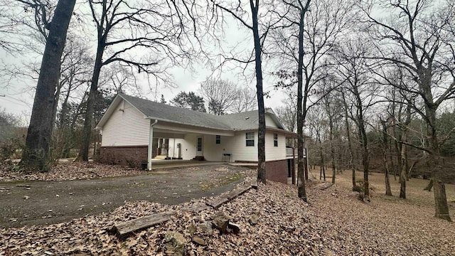 exterior space featuring a carport