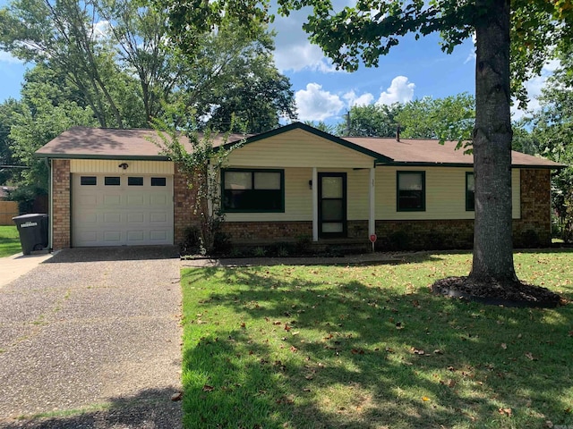 35 Greenhaven Pl, Jacksonville, AR 72076 - ranch-style home with an attached garage, driveway, brick siding, and a front lawn