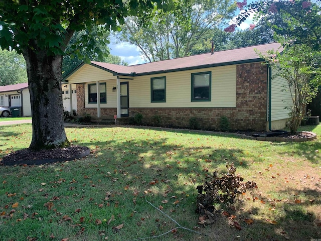 35 Greenhaven Pl, Jacksonville, AR 72076 - ranch-style house with brick siding, a front yard, and cooling unit