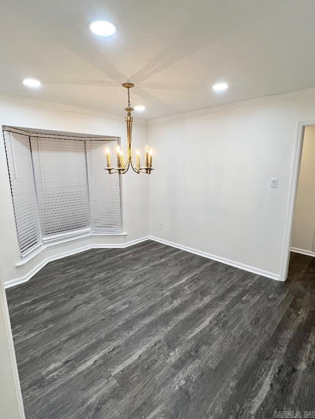 unfurnished dining area with a notable chandelier, crown molding, and dark hardwood / wood-style floors