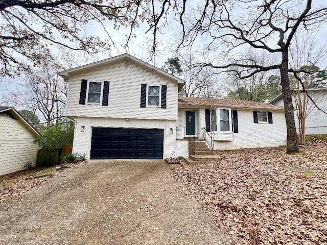 split level home with a garage