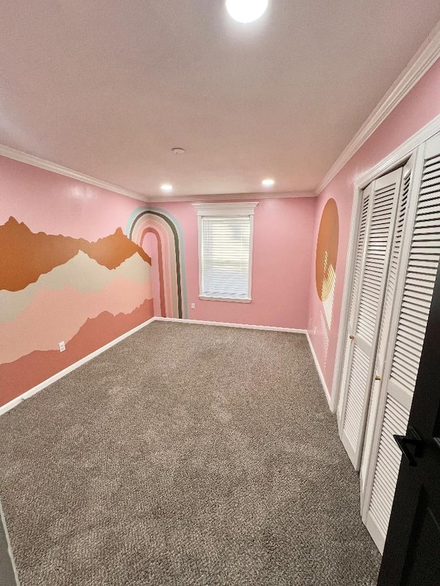 basement with crown molding and carpet floors