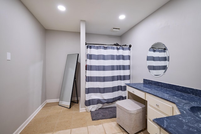 bathroom featuring vanity and tile patterned floors