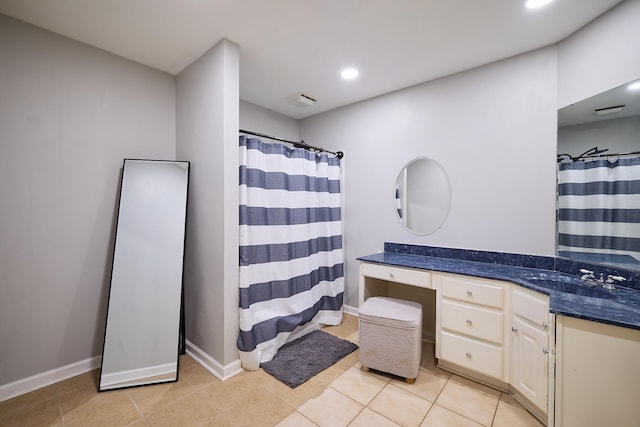 bathroom featuring vanity and tile patterned floors