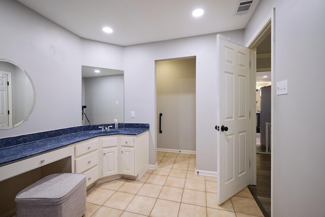 bathroom featuring vanity and tile patterned floors