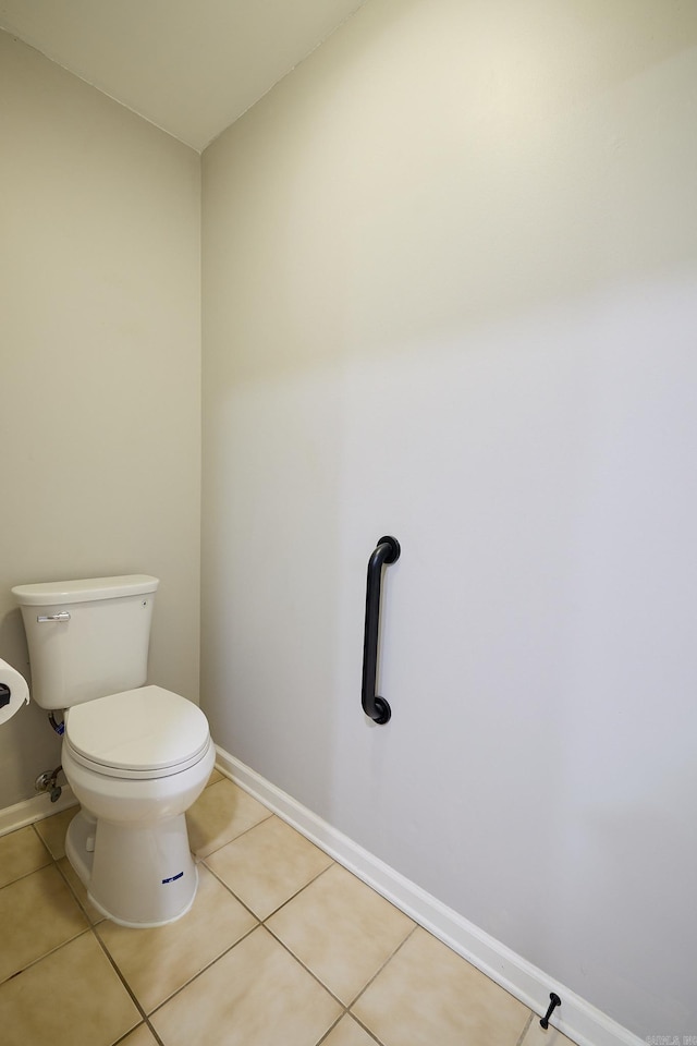 bathroom featuring tile patterned floors and toilet