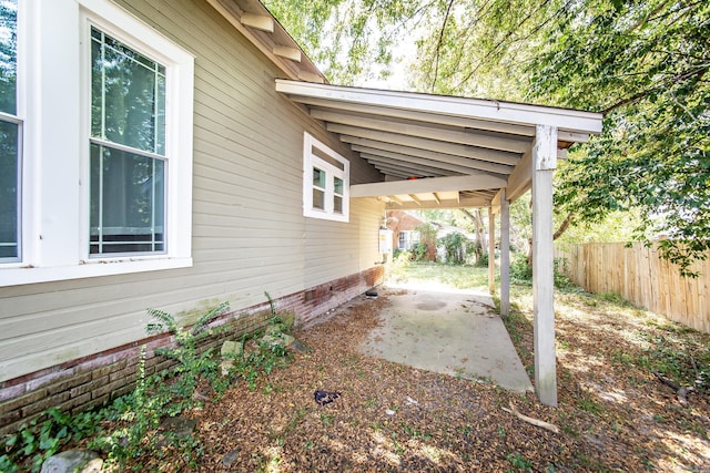 view of property exterior featuring a patio