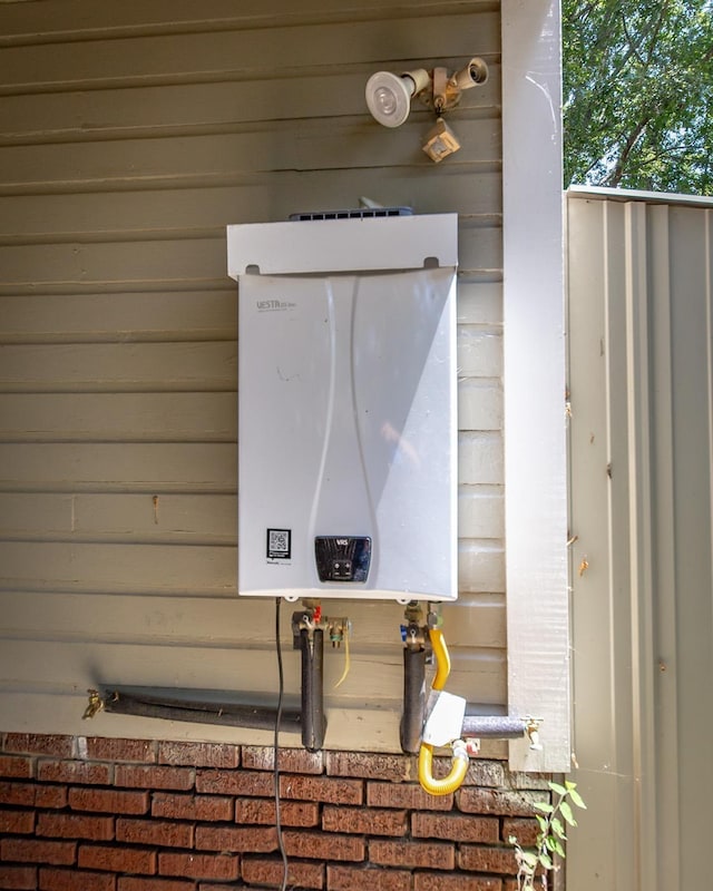 exterior details with tankless water heater