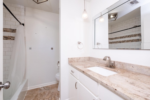 full bathroom featuring vanity, shower / bath combo, and toilet