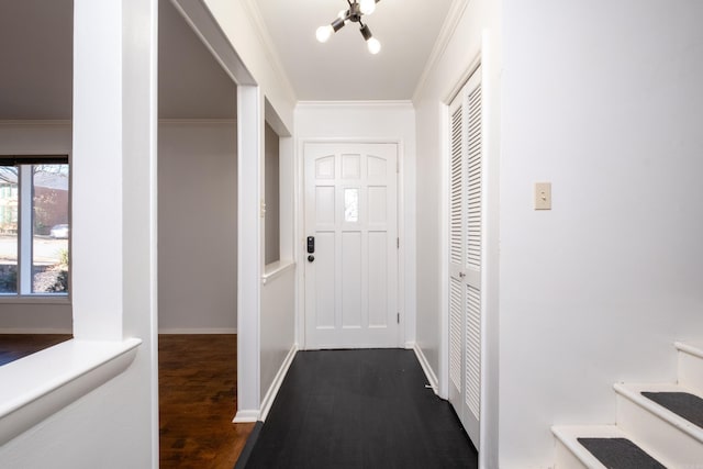 hallway with dark wood-type flooring and ornamental molding