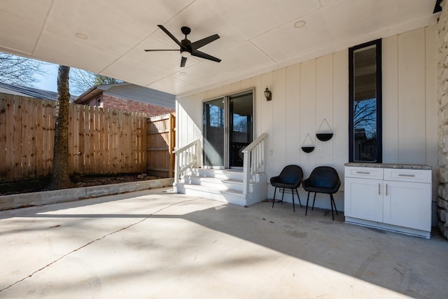 view of patio / terrace featuring ceiling fan