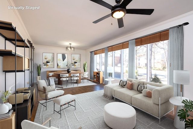 sunroom featuring ceiling fan