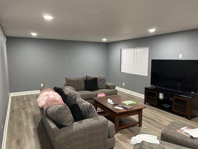 living room with light hardwood / wood-style floors