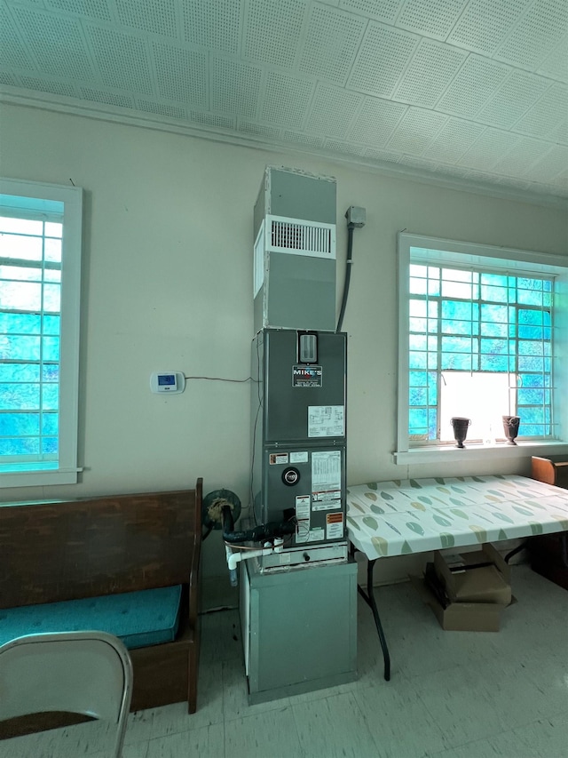 utility room with heating unit