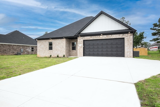 view of front facade with a garage and a front yard