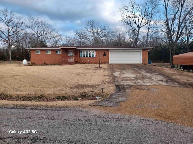 single story home featuring a garage