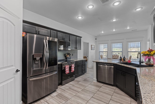6898 Grace Village Dr, Alexander, AR 72002 - kitchen with light tile patterned flooring, sink, light stone counters, appliances with stainless steel finishes, and backsplash