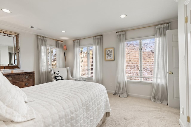 carpeted bedroom with crown molding