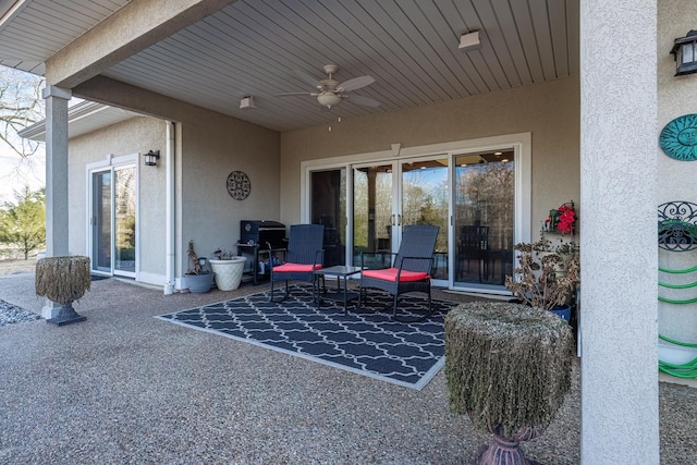 view of patio / terrace featuring ceiling fan