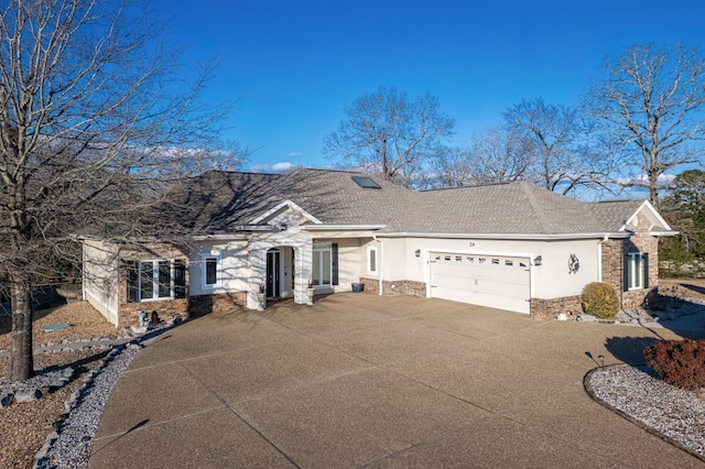 single story home with a garage