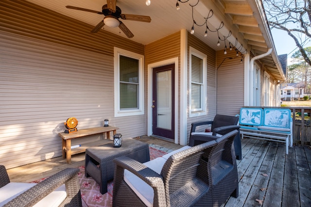 deck featuring an outdoor hangout area and ceiling fan