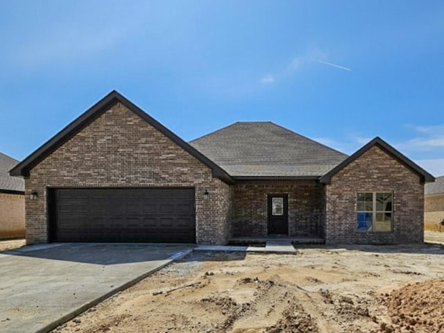 view of front of home featuring a garage