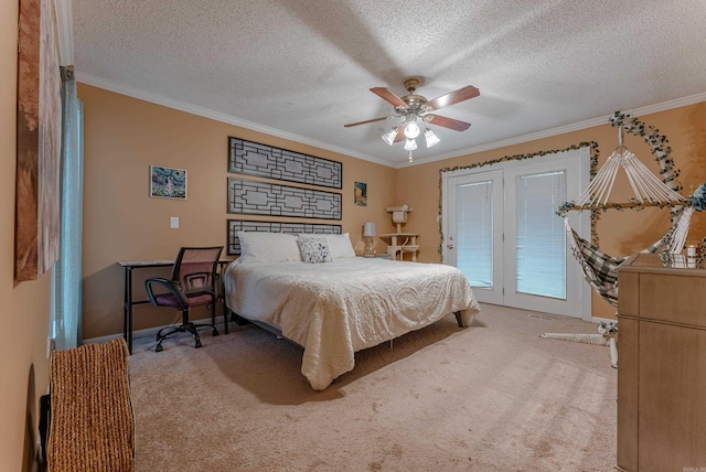 carpeted bedroom with a textured ceiling, access to outside, ornamental molding, and ceiling fan