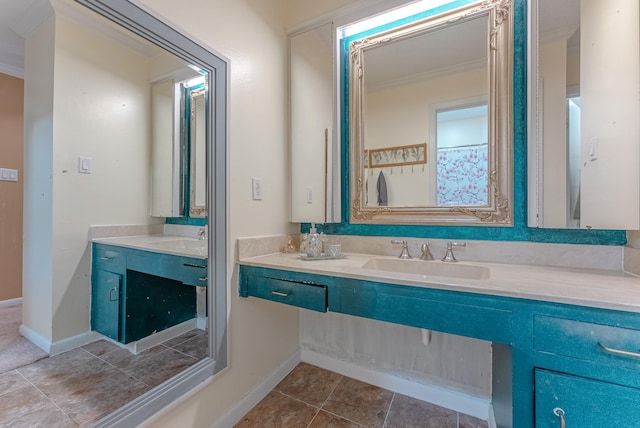 bathroom featuring crown molding and vanity