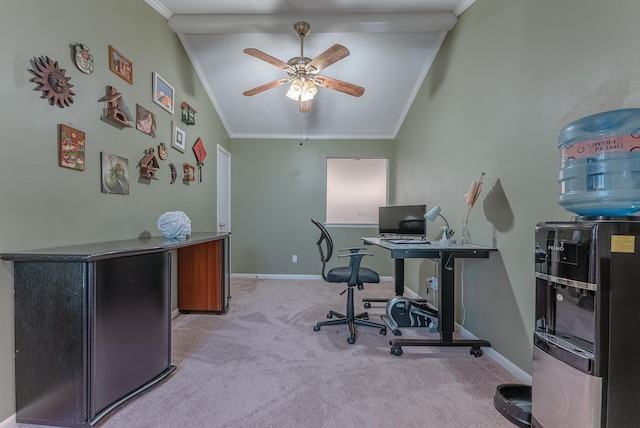 home office featuring ceiling fan, light colored carpet, crown molding, and vaulted ceiling