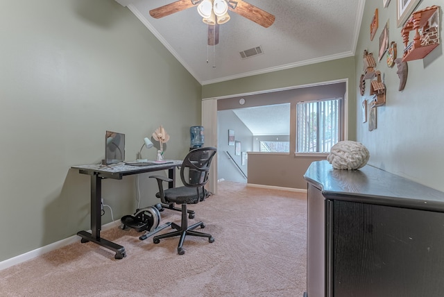 carpeted office space featuring crown molding, ceiling fan, lofted ceiling, and a textured ceiling