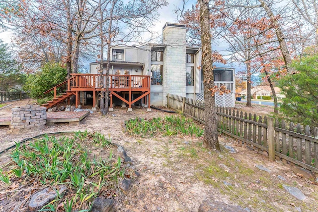 rear view of property with a deck