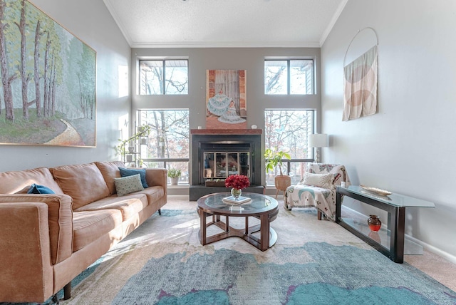 carpeted living room with lofted ceiling, crown molding, and a textured ceiling