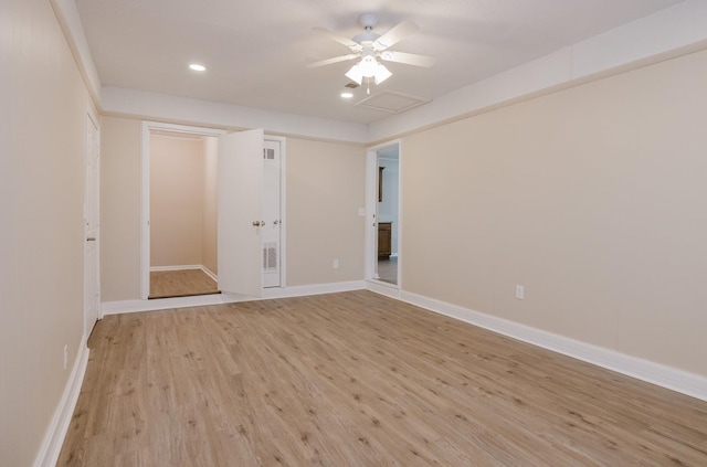 unfurnished room with ceiling fan and light hardwood / wood-style flooring