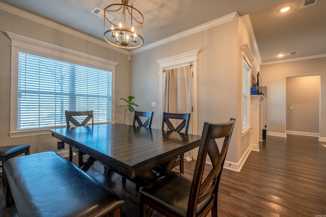 dining space featuring crown molding, a healthy amount of sunlight, and a notable chandelier