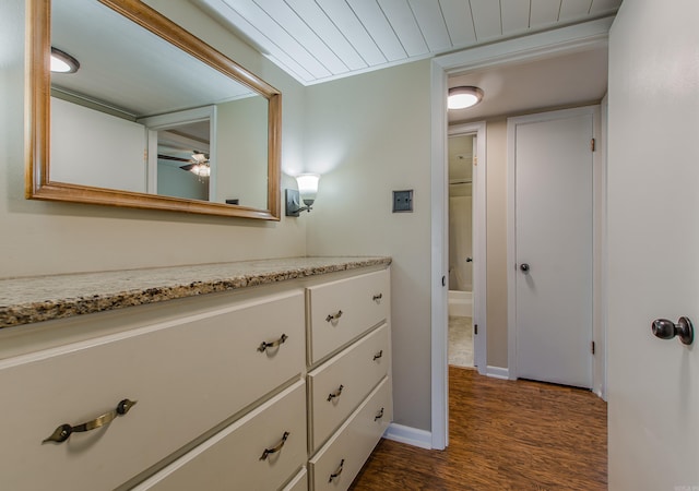 bathroom featuring hardwood / wood-style flooring and vanity