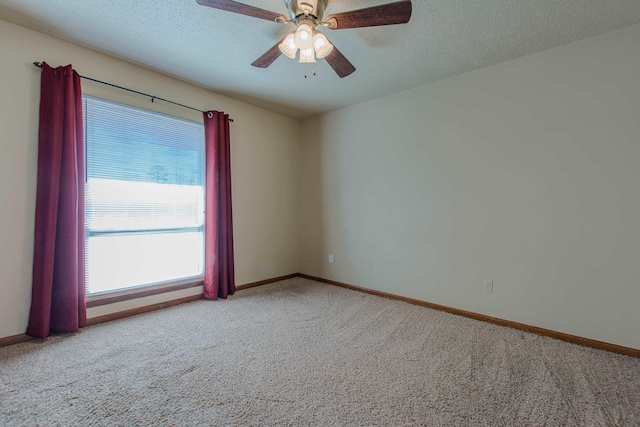 unfurnished room with light carpet, a textured ceiling, and ceiling fan