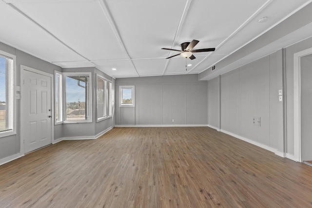 spare room featuring ceiling fan and hardwood / wood-style floors