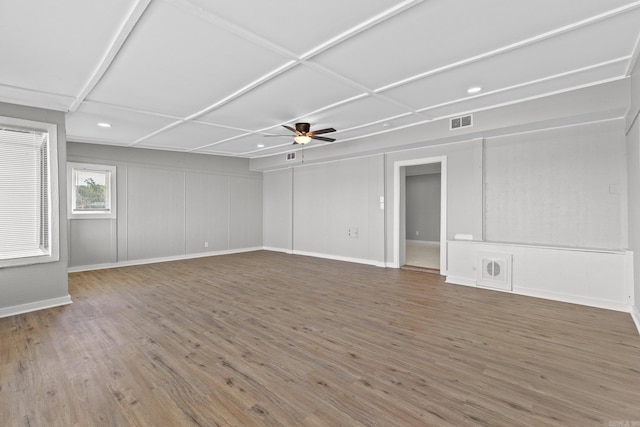 spare room featuring hardwood / wood-style flooring and ceiling fan