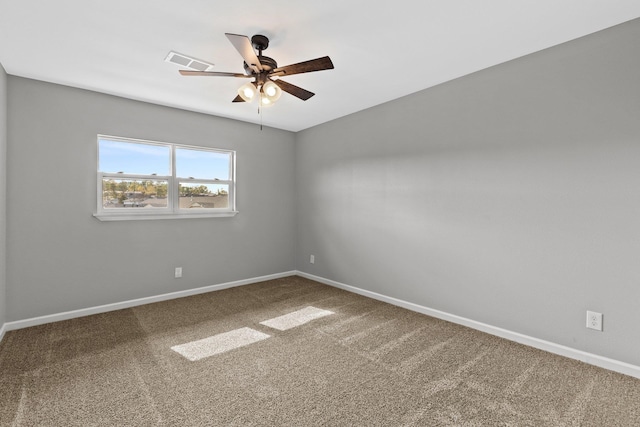 carpeted empty room with ceiling fan