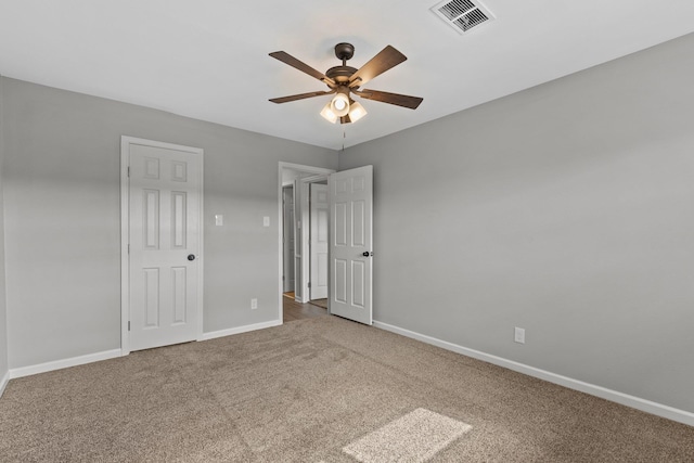 unfurnished bedroom featuring carpet floors and ceiling fan