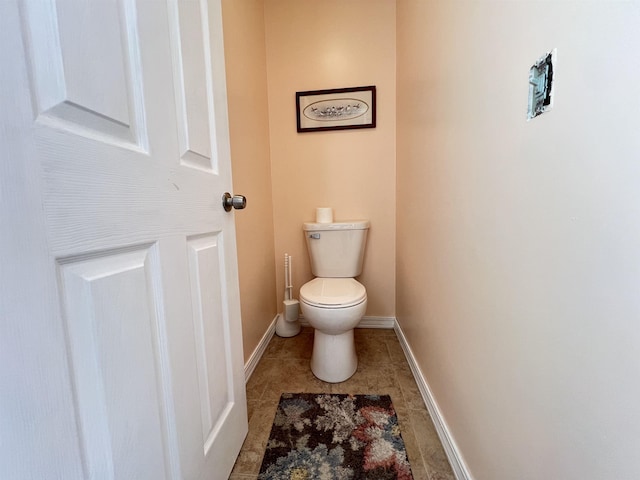 bathroom featuring toilet