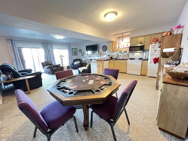 view of carpeted dining room