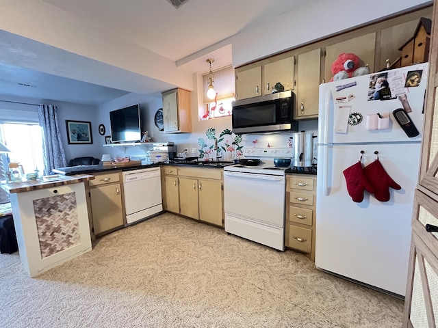 kitchen featuring light carpet, pendant lighting, white appliances, and kitchen peninsula