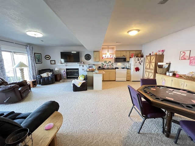 dining area with light colored carpet