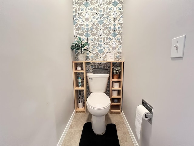 bathroom featuring tile patterned floors and toilet