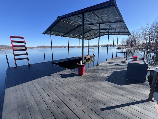 dock area featuring a water view