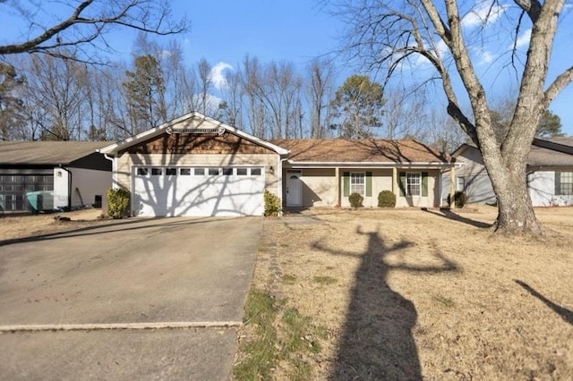 single story home with a garage