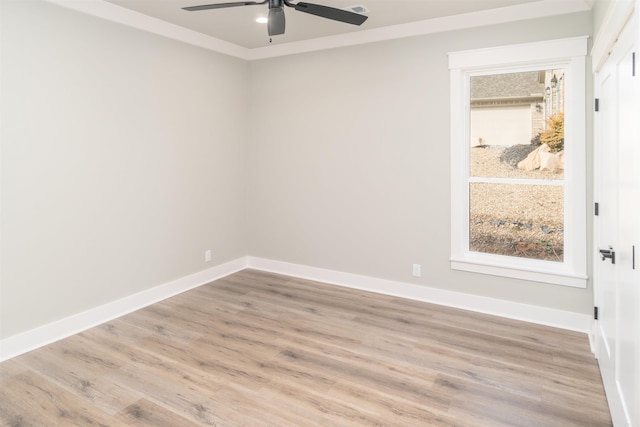 unfurnished room with crown molding, light hardwood / wood-style floors, and ceiling fan